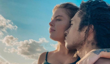 Luisa Sonza e Vitão abraçados de perfil