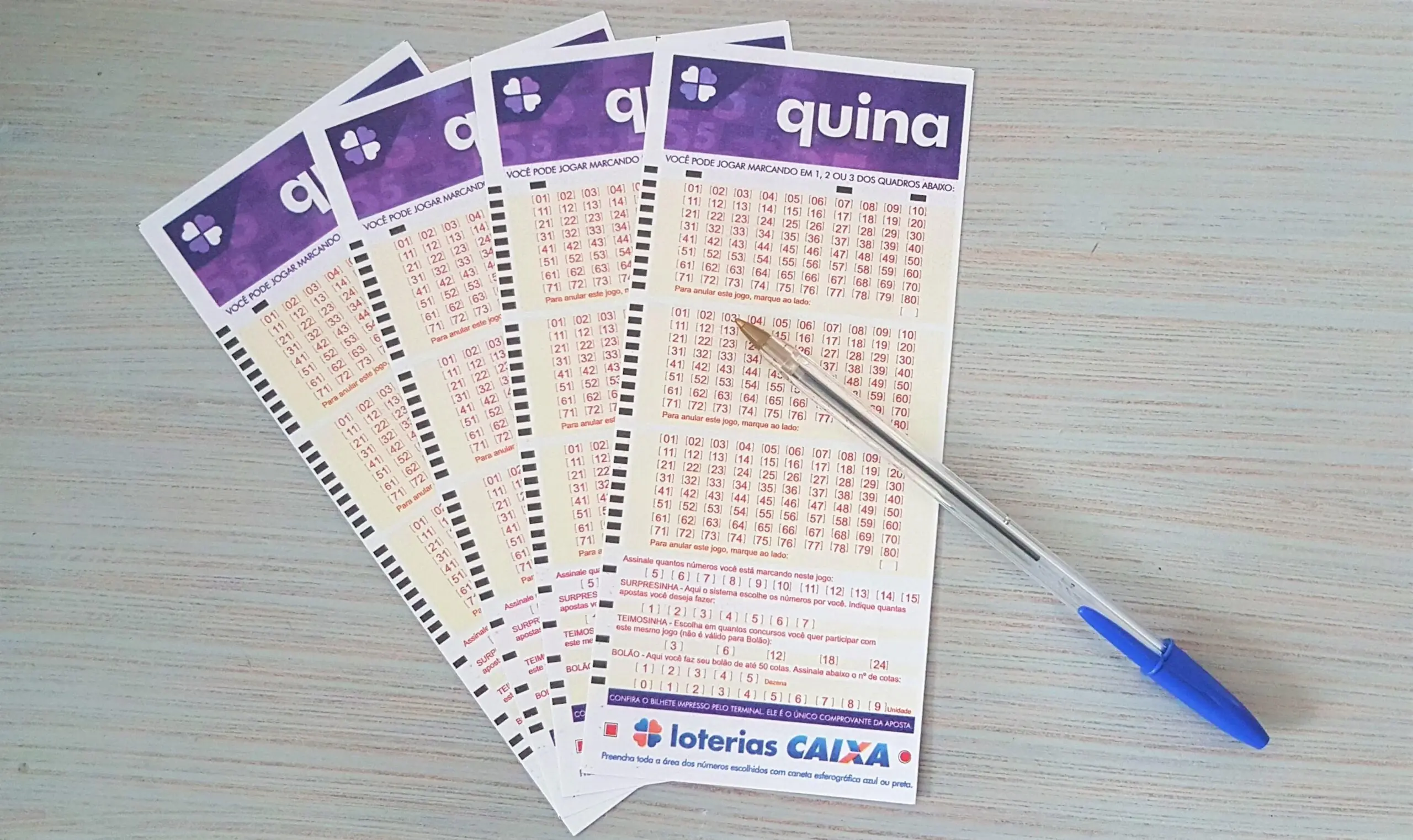 resultado da quina 5465 A imagem mostra quatro volantes da Quina