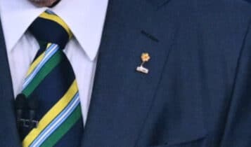 Imagem mostra broche de lula no debate na band